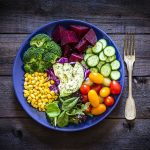 salad-mix-plate-shot-from-above-on-rustic-wooden-royalty-free-image-1018199524-1556130377